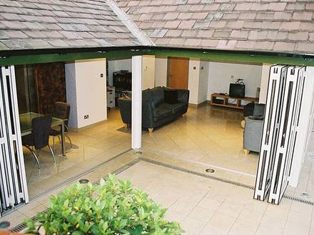 Glas-Faltwand SF 55 wärmegedämmte Aluminiumprofile Glas-Faltwand SF 55 wärmegedämmte Aluminiumprofile